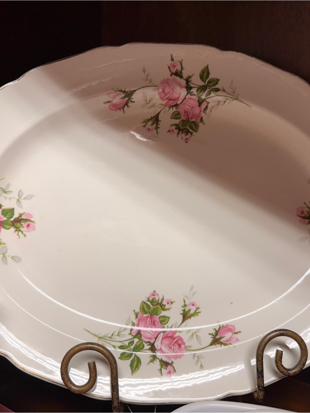 A vintage Canonsburg Pottery Moss Rose pattern oval serving platter.
